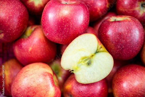 slice piece of apple with group of red apples photo