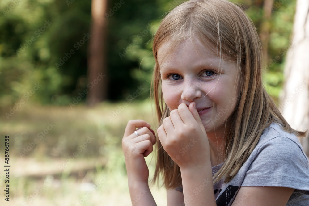 Happy little girl is laughing. Smiling child Happy little girl is laughing. Smiling child