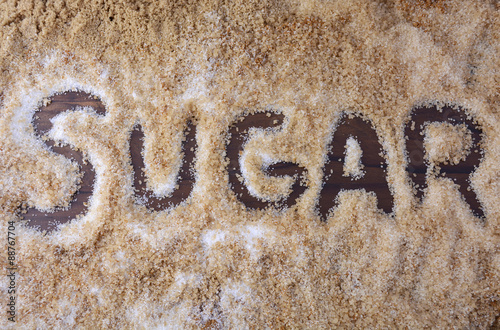The word, sugar, written in various types of sugar.