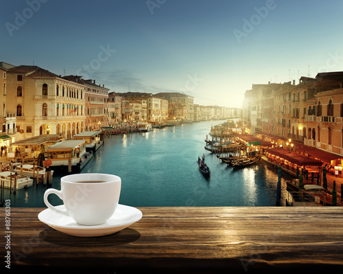 coffee on table and Venice in sunset time, Italy