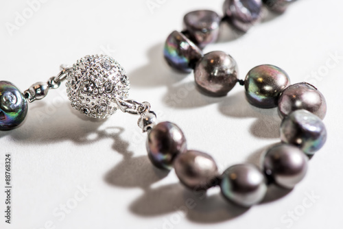 Black pearl necklace with diamond pendant