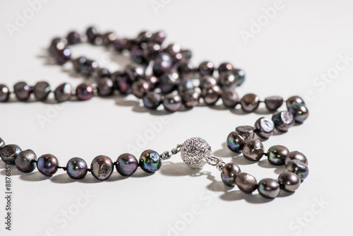 Black pearl necklace with diamond pendant photo