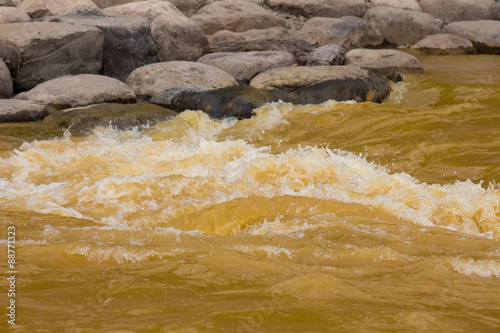 Orange whitewater due to a toxic mine waste spill by the EPA in Silverton, Colorado