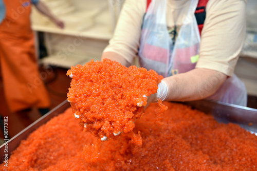 Handful of salmon caviar