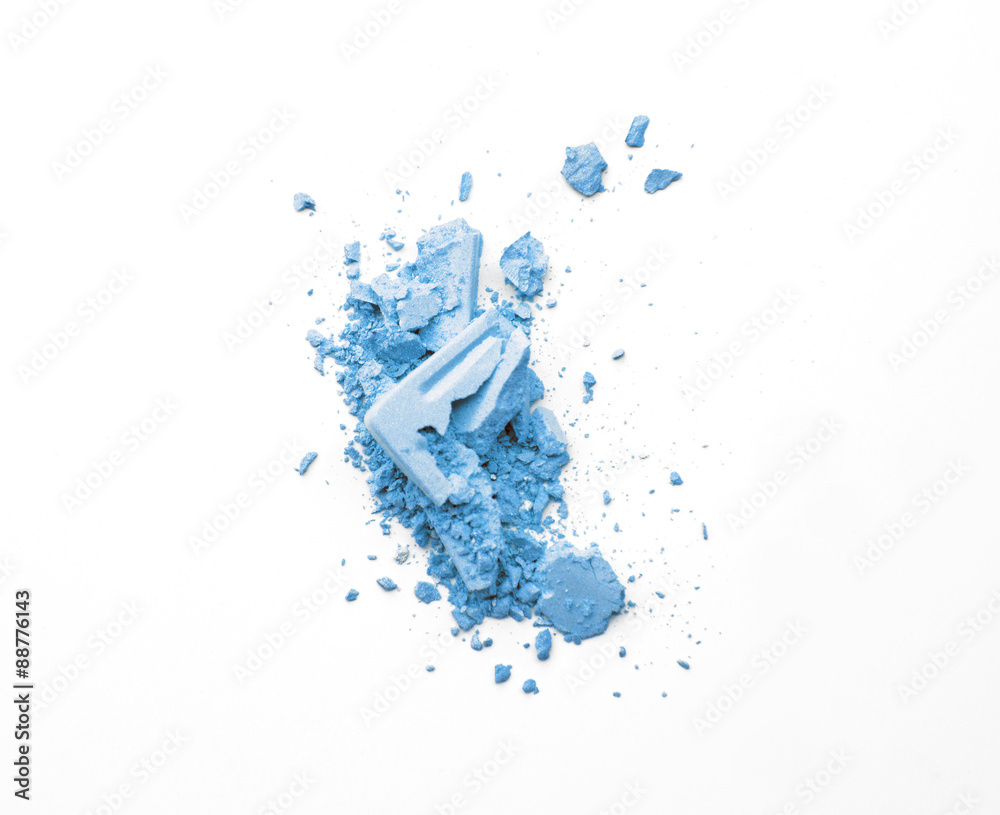 Fototapeta premium Crushed makeup on white background. The eye shadows.