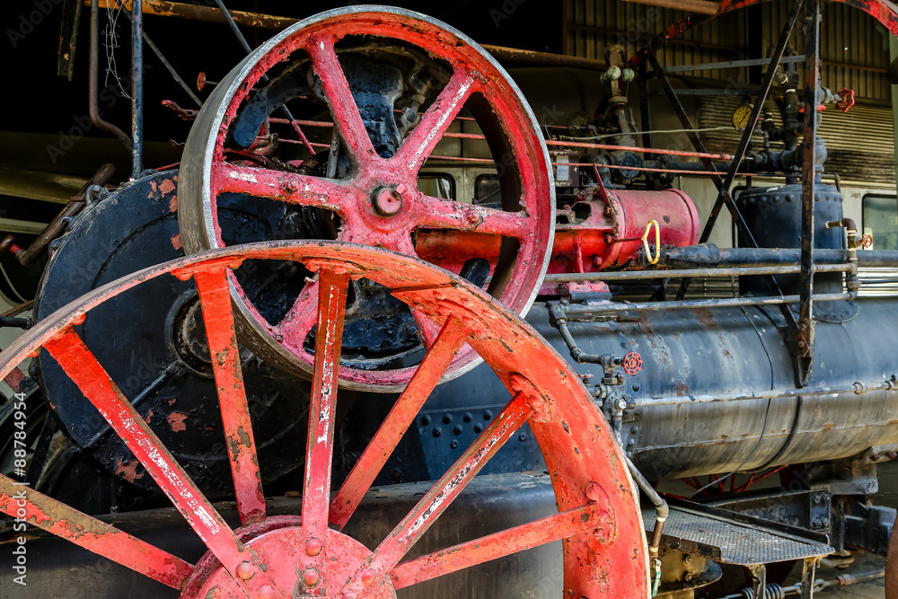 Red Metal Wheels on Machinery