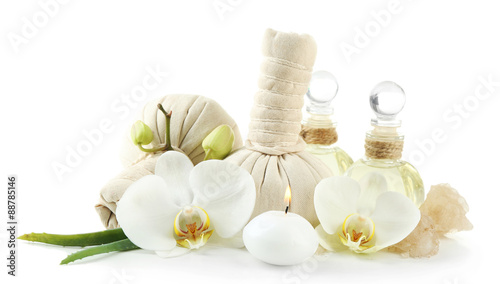 Fototapeta Naklejka Na Ścianę i Meble -  Composition with massage bags, sea salt and orchid flower, isolated on white