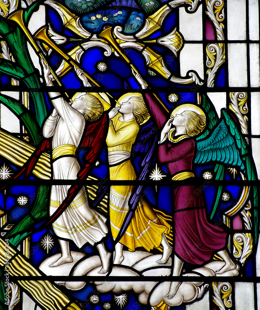 Angels blowing on a trumpet (stained glass)