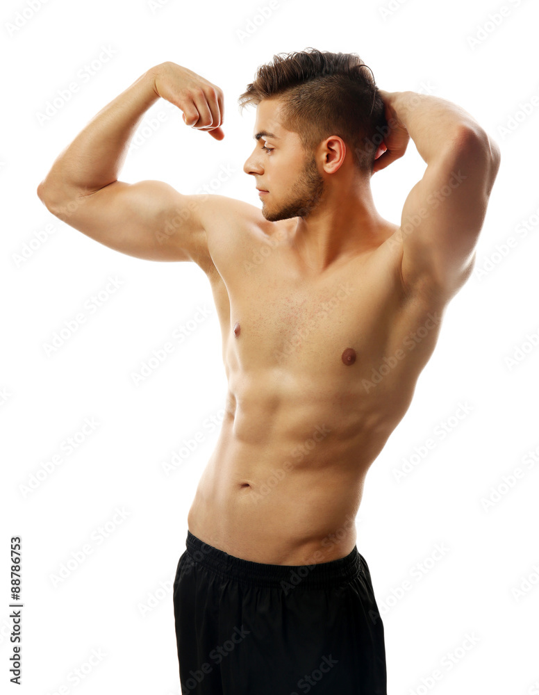 Muscle young man isolated on white