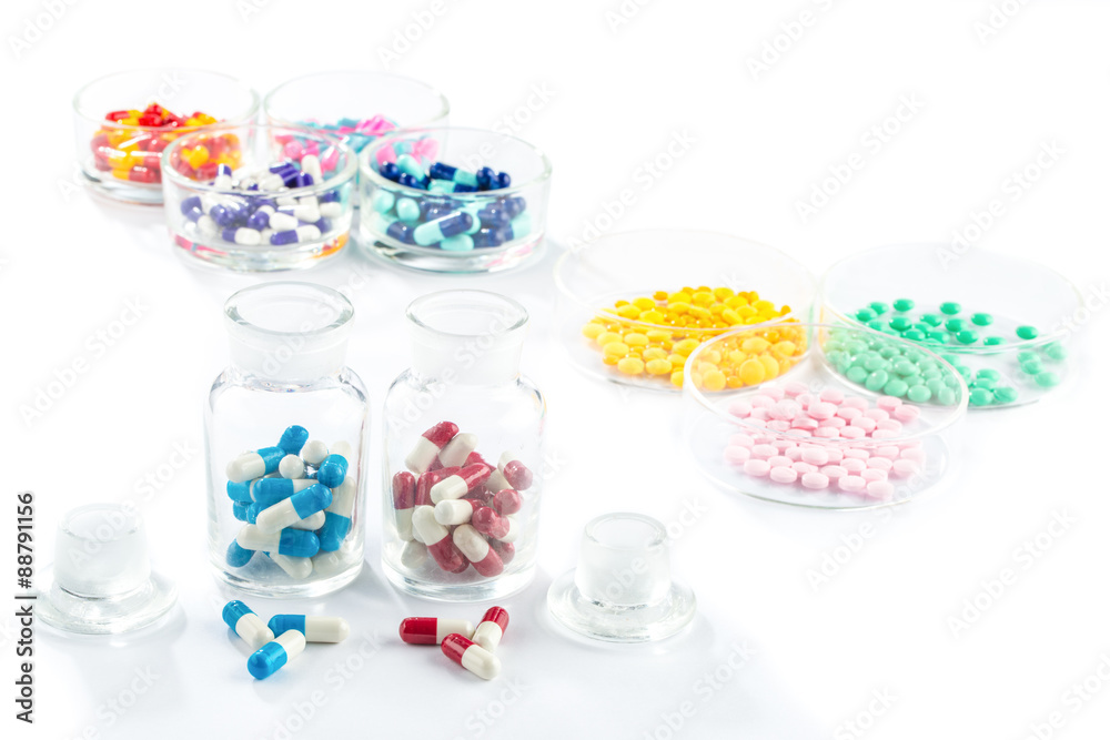colorful capsule in Pill Container,  Healthcare And Medicine