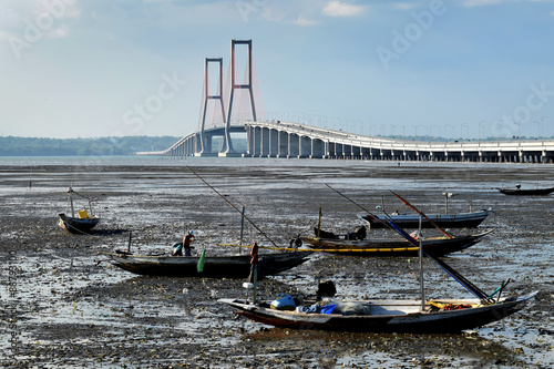 Photography Suramadu bridge in Surabya, Indonesia with water, dry