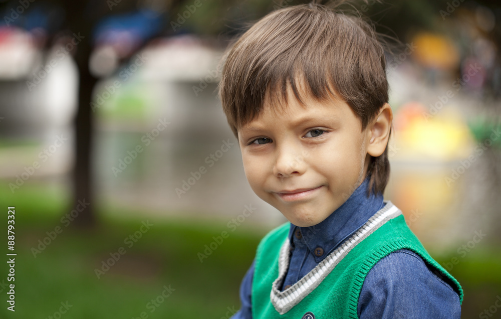 Fashionable little boy outdoor at the nice summer day Fashionable little boy outdoor at the nice summer day