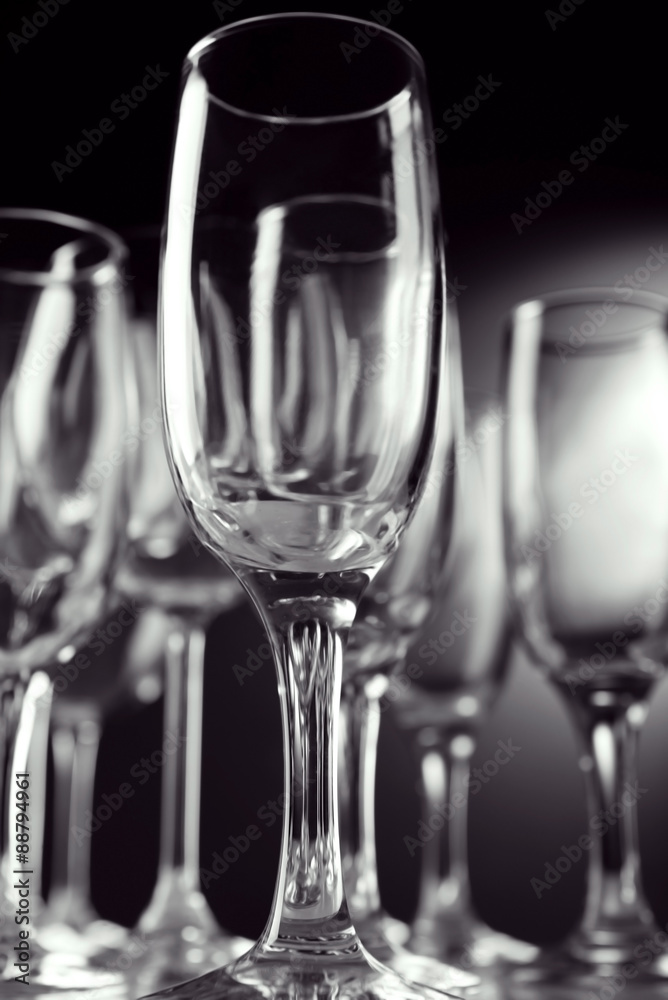 Empty champagne glasses on gray background