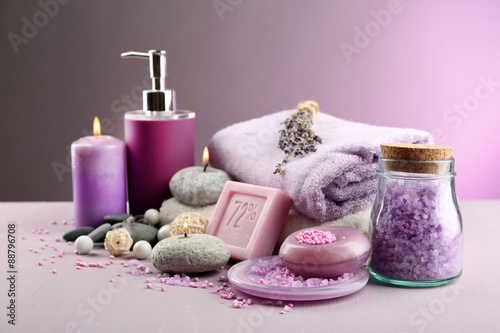 Fototapeta Naklejka Na Ścianę i Meble -  Spa treatments on colorful background. Lavender spa concept