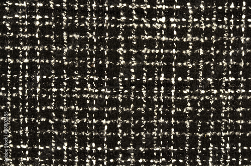 Black and white wool twill pattern. Woven design as background.