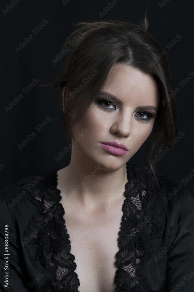 Beautiful woman portrait in dark