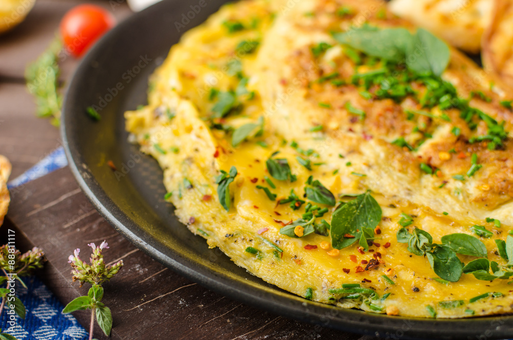 Herb omelette with chives and oregano sprinkled with Herb omelette with chili flakes Herb omelette with chives and oregano sprinkled with Herb omelette with chili flakes