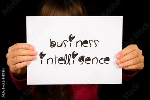 Person holding Business Intelligence sign