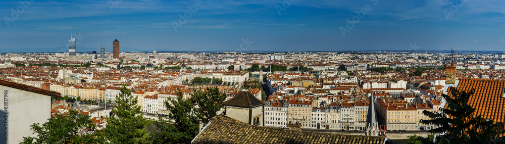 Panoramic overview to Lyon city, orange roofs and new buildings