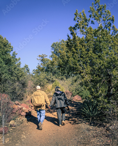 Hikers on a trail © Alexey Stiop