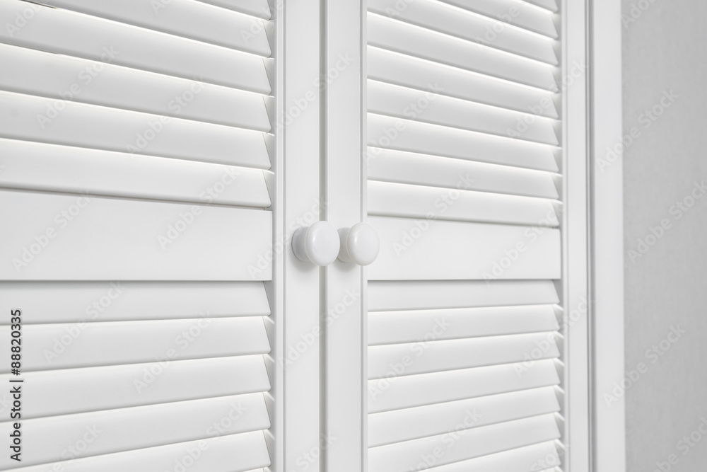 Closed White Door on grey Wall Closed White Door on grey Wall