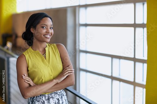 Free Download Portrait of a confident businesswoman at work in herglass office - GFXLoad