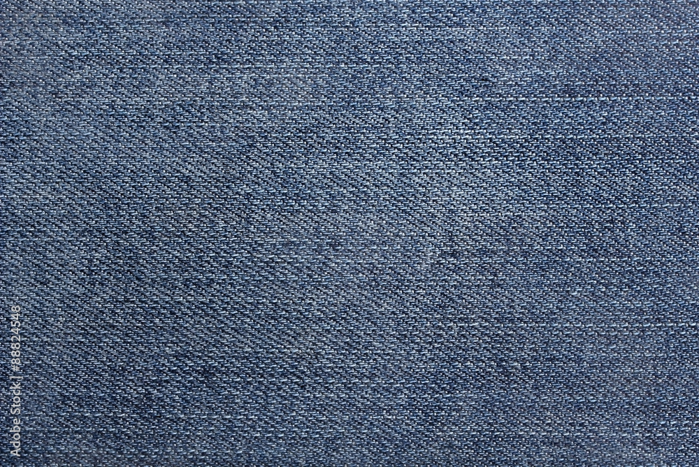 Texture of blue jeans textile close up Texture of blue jeans textile close up