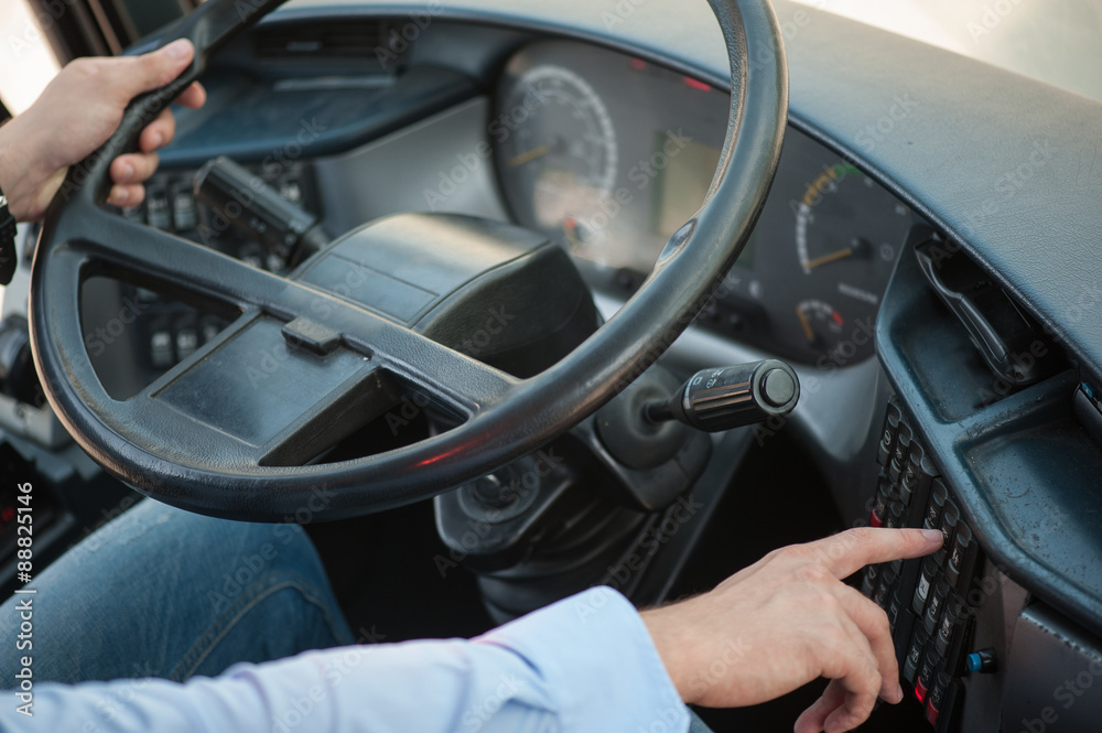 Young experienced driver is starting a public transport Young experienced driver is starting a public transport