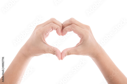 Female hands in the form of heart isolated