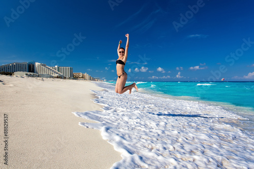 Beautiful woman on the Cancun beach 