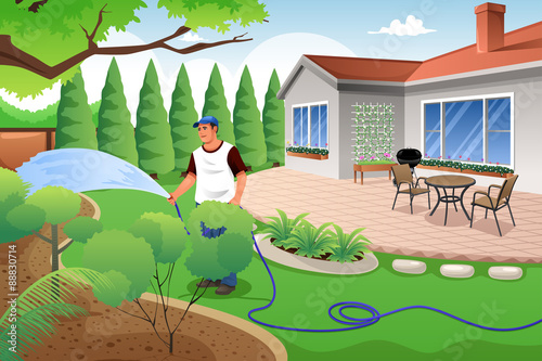 Man watering his grass and garden