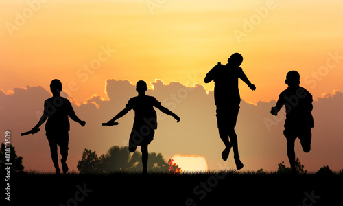athlete  running   at sunset background