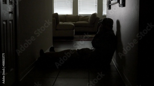 A soldier's dog rises to comfort him in the hallway, 4K