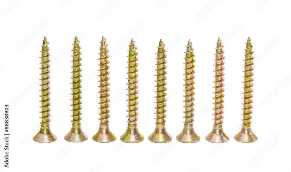Several wood screws with countersunk head on light background Several wood screws with countersunk head on light background