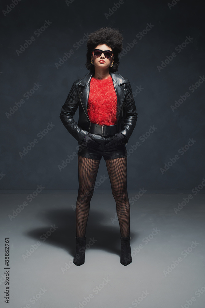 Hipster African-American lady in leathers