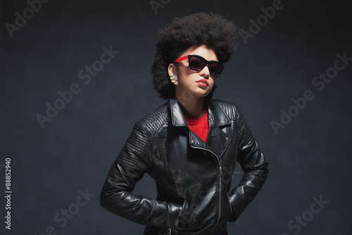 Stylish Woman in Leather Jacket with Sunglasses