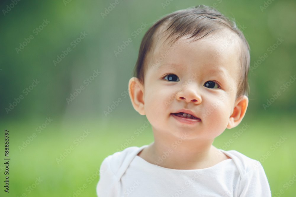 Baby happy in garden, new family and love concept (soft focus on Baby happy in garden, new family and love concept (soft focus on