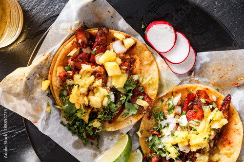 Фотография mexican al pastor street tacos overhead shot close up