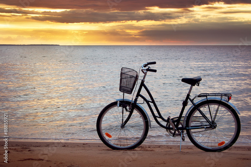 Lonely bike standing at sunset © candy1812