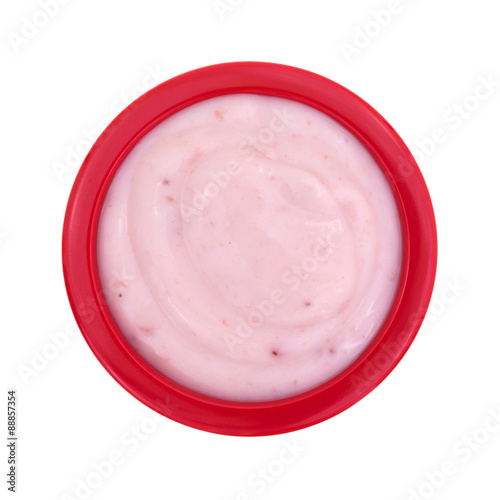 Strawberry yogurt in a small red bowl
