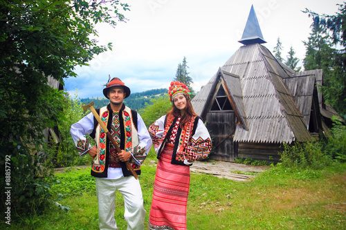 couple in traditional hutsul costumes in western ukraine photo
