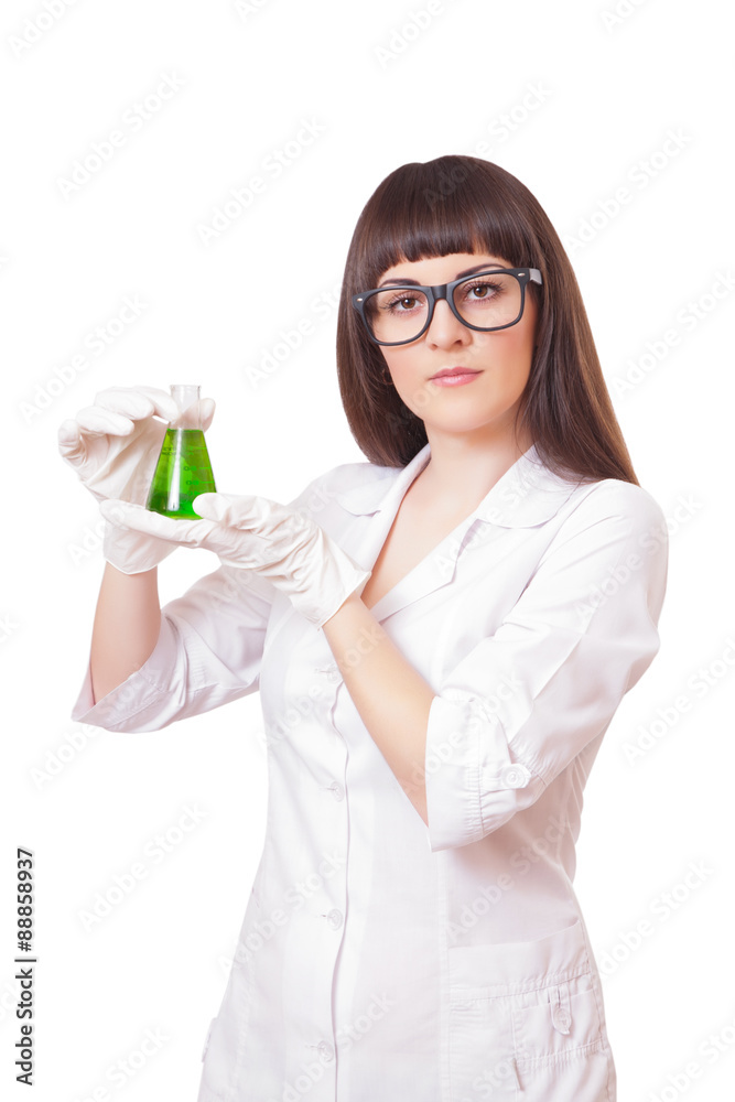 Female lab worker holding flask Female lab worker holding flask