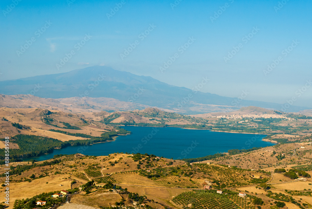 The lake of Pozzillo, with volcano Etna in background