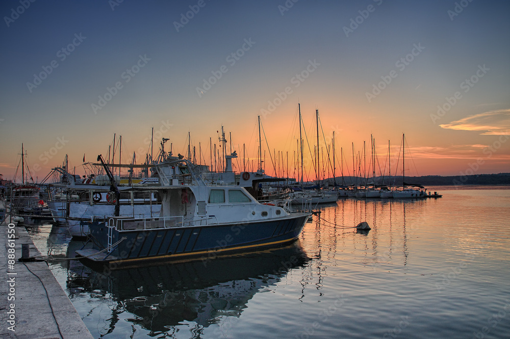 Harbour with boats at sunset time in Croatia