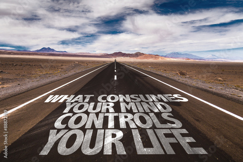 What Consumes Your Mind Controls You Life written on the road