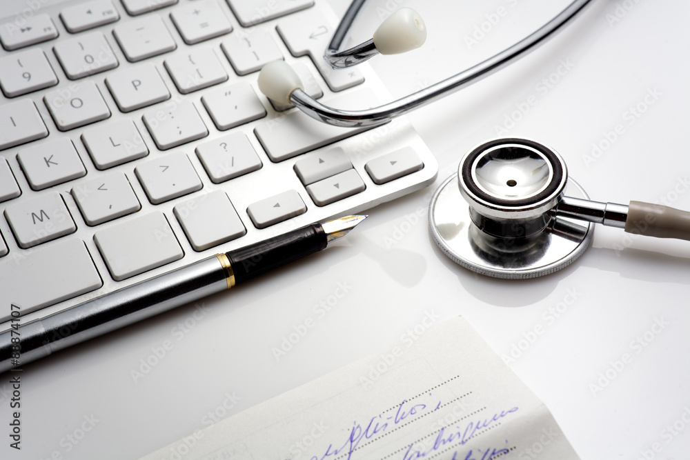 Stethoscope with a computer keyboard Stethoscope with a computer keyboard