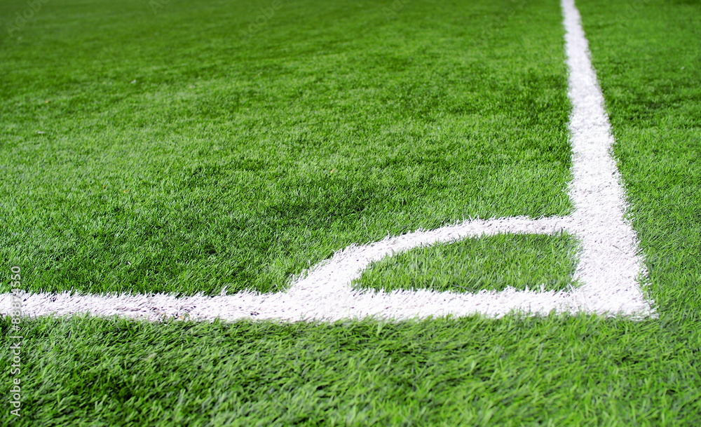 Corner area chalk line on artificial turf soccer or football field
