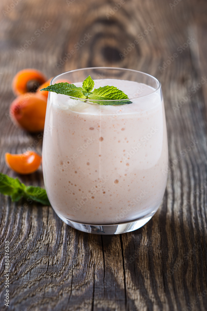 Homemade fresh summer fruits smoothie with ripe apricots Homemade fresh summer fruits smoothie with ripe apricots