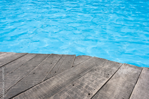 .Swimming pool and wooden deck for backgrounds