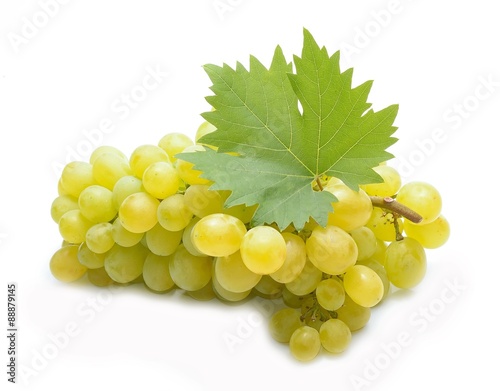 Fresh green grapes with leaves
